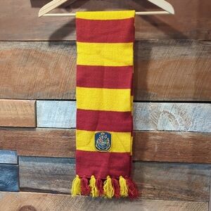 Red and Yellow Striped Scarf with Crest